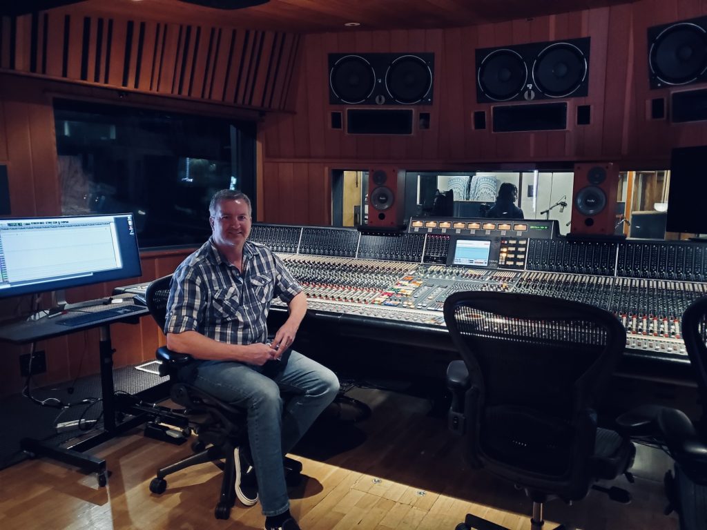 Rock music producer Eric Welz at the console